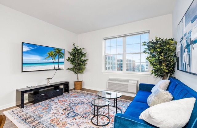 Urban Elegance: 20 Minutes to NYC with Luxe Amenities- Gym and Laundry In Unit