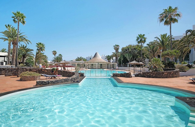 Vacation Apartment 'Al Sole Studios Playa Roca' with Sea View, Shared Pool and Wi-Fi