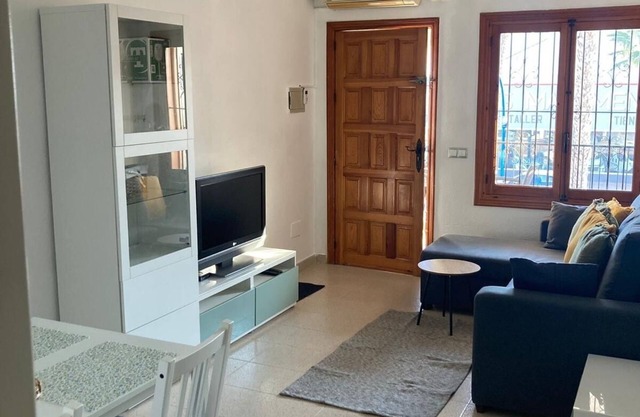 Vacation apartment with private roof terrace within walking distance of the city center and beach
