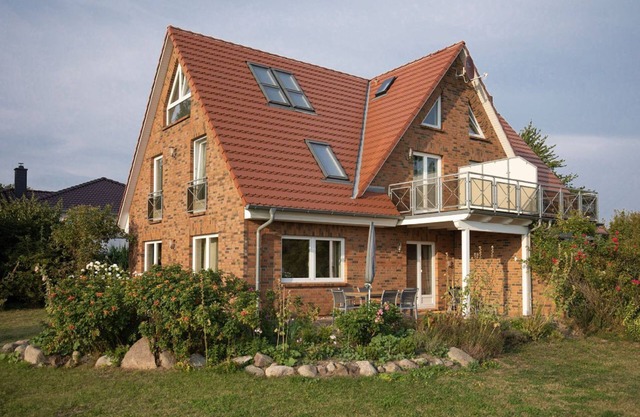 Vacation home Hideaway - close to the beach, chic vacation home with beautiful garden -