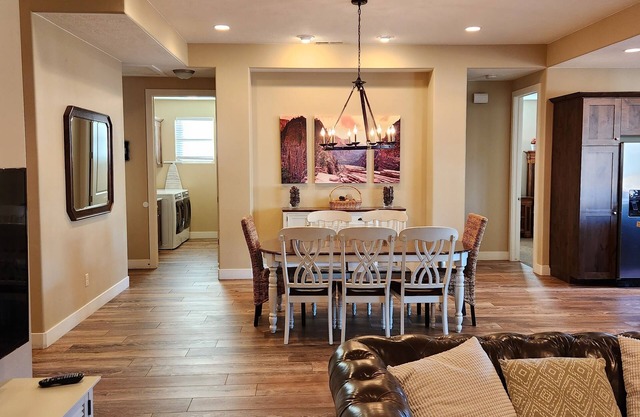 Vacation home opens up directly to the heated pool and open park!