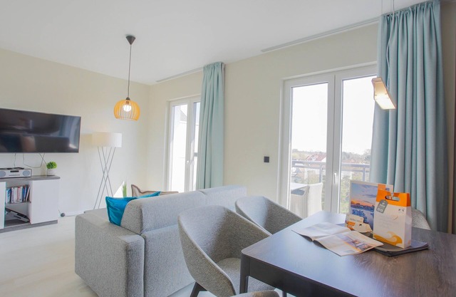 Vacation in the vacation apartment Sommerzeit on the Bodden and the Baltic Sea with an east-facing balcony