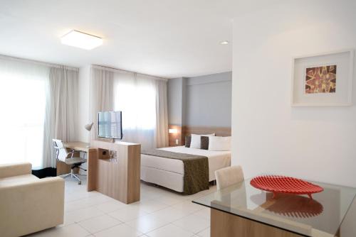 Verano Stay Flat com cozinha, garagem, wi-fi 400 megas perto Arena e Parque Olímpico