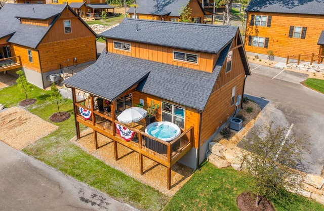 Vibrant 2BR Cabin with Private Hot Tub, Resort Pools & Game Nook