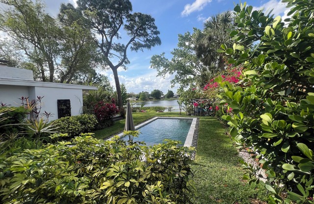 Vibrant Orlando Lakefront Cat Lover's Retreat with Pool & Gardens