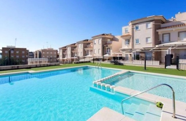 Villa 'Adosado Santa Pola' with Shared Pool, Wi-Fi and Air Conditioning
