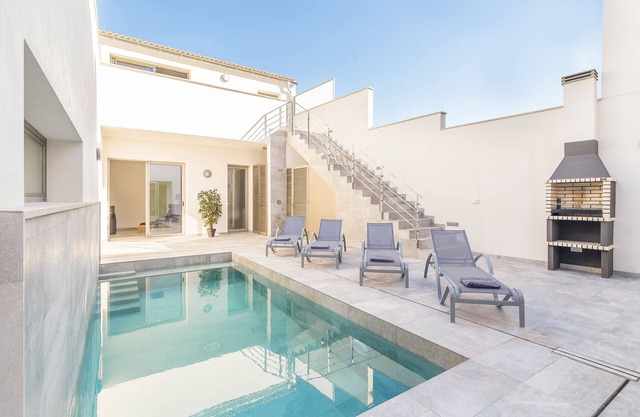Villa Margalida. Spectacular newly built villa with heated pool.