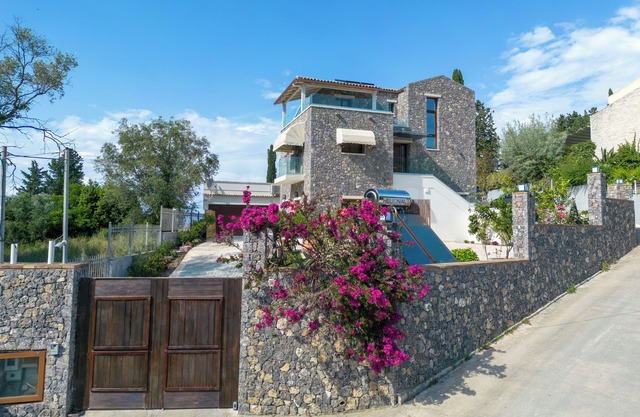 Villa Nera: Luxurious seaview retreat in Corfu's Kefalomandouko Hill.