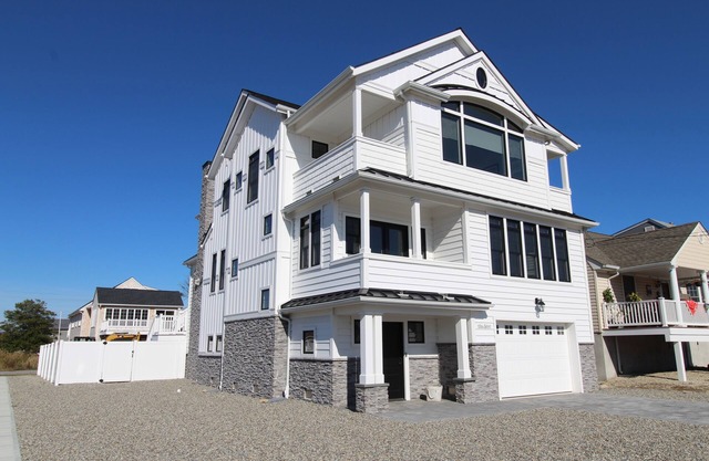 WASH115 | Breathtaking custom coastal 5BR 4ba home! Saltwater pool, cabana rm, views & more!
