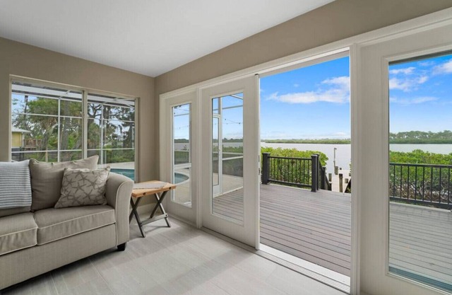 Waterfront Bliss in Bradenton, Florida: Your Dream Rental with a Screened Pool and Private Dock!