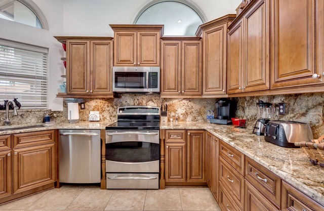 Waterfront Home w/Heated Pool and 1 Garage Spot Near Shops!