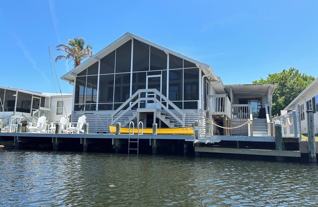 Waterfront retreat with boat dock & private ramp right off the river