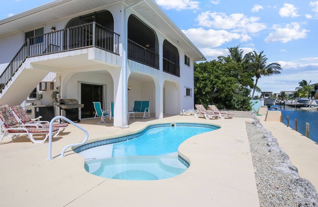 Waterfront, two-story house w/private outdoor pool, poolside grill, boat access