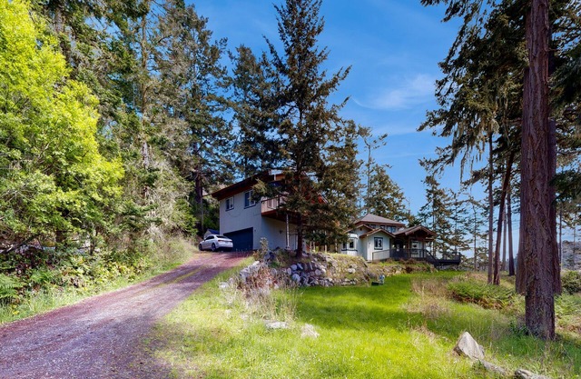 Waterview dog-friendly retreat with beach access, hot tub, and large deck