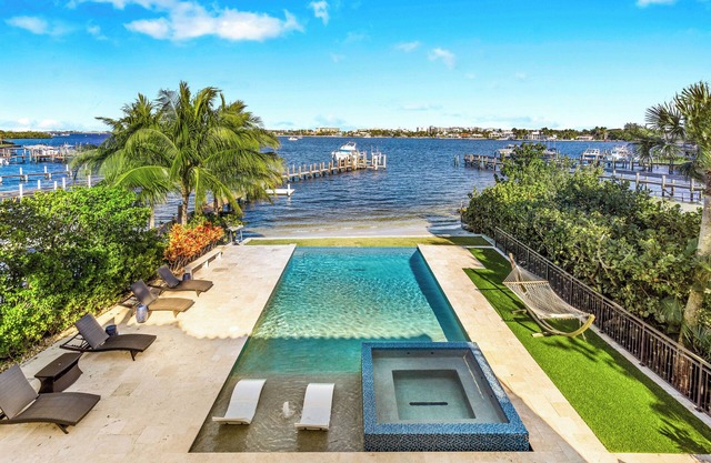 Welcome to "Once Upon a Tide" - A magnificent waterfront home with infinity pool