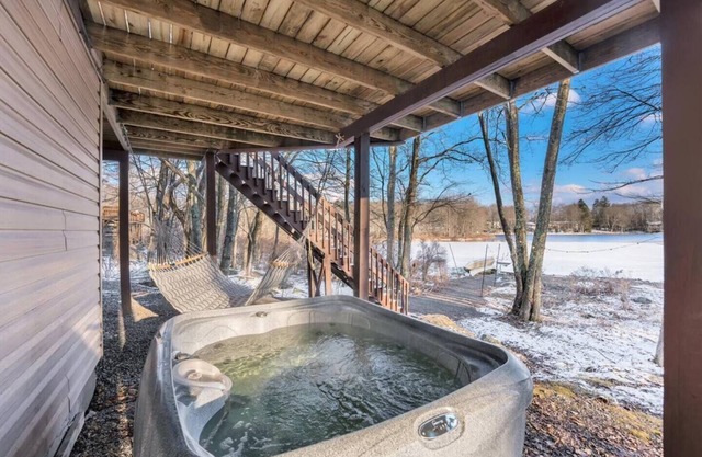 Welcome to your LAKEFRONT& FUN-FILLED home in the resort-like Big Bass Lake Community