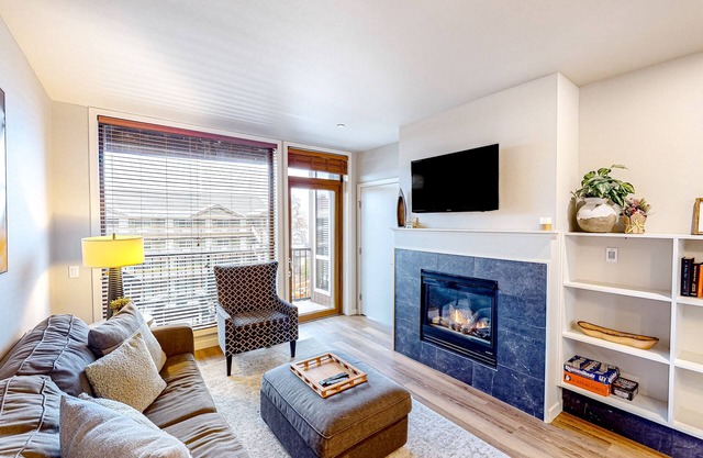 Welcoming condo with private balcony, pool, hot tub, & mountain/lake views