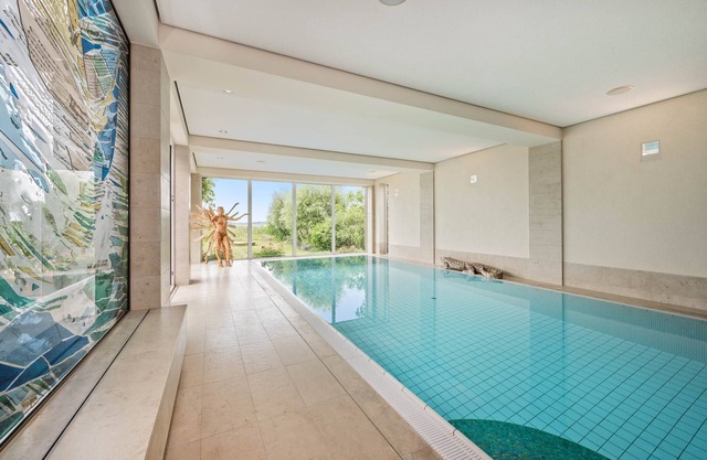 Wellness Apartment mit Pool, Sauna, Fitness und Wasserblick