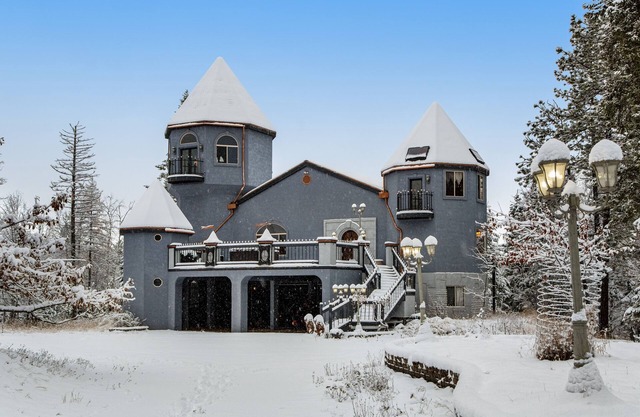 Whimsical acreage with high-end finishes, old-world character, air hockey, & W/D