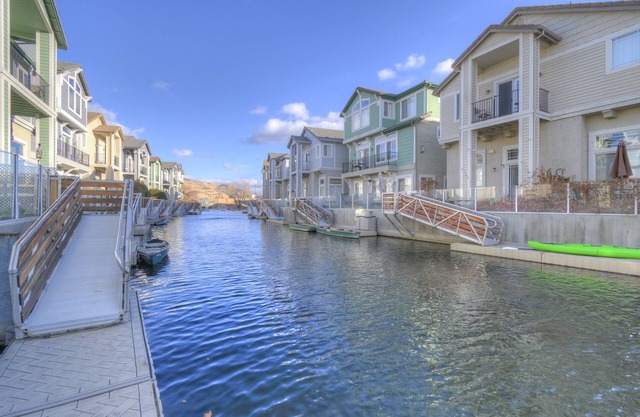 WONDERFUL FIVE BEDROOM HOME OVERLOOKING THE LAKE AND MARINA