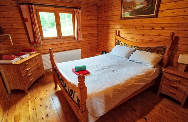 Wooden log cabin entirely place