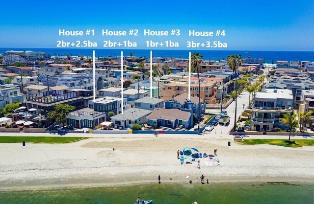 WOW 130' of Water Front * 4 Houses * 10 Parking * AC