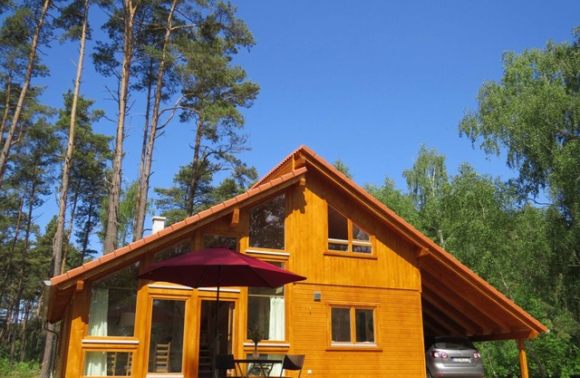 Your house on the lake with a fireplace, sauna and bathing area nearby!