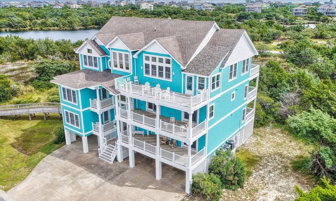 Avon House | 1-acre waterfront oasis with pool, hot tubs & sunrise/set views - dog-friendly