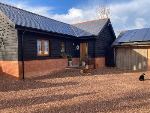 Ottery St Mary House | 1 Bed Flat - Sleeps 4 - Garden - Parking - Wifi