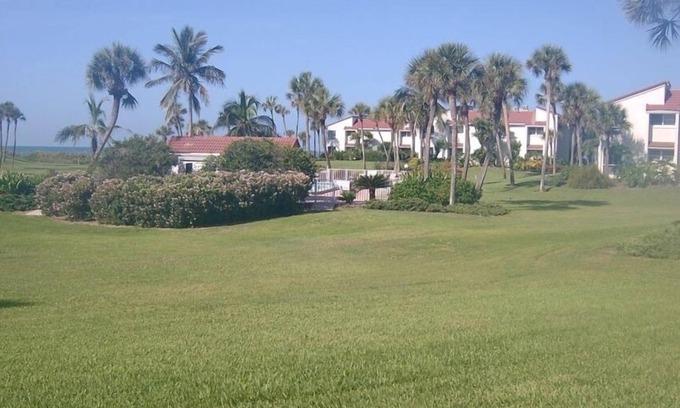 Whitney Beach Condo | 1st Floor Home Away from Home - Steps to Beach - Pool
