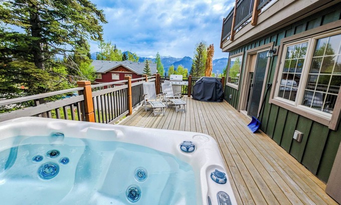 Golden Condo | 2-bedroom condo with hot tub and mountain views