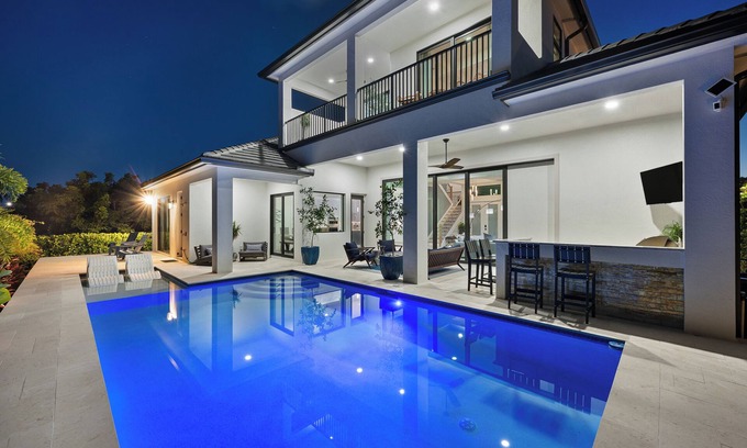 Marco Island House | 2024 4 Bed Home (Option- Golf Carts Rental) (Car rental option)- Water view with Heated Pool , Outdoor Kitchen/Bar