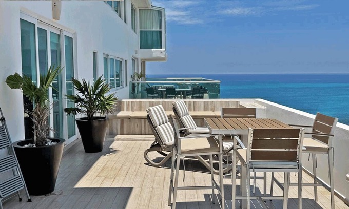 Zona Hotelera Condo | #2704-Tim’s Ocean Condos – Beachfront - Private Terrace & Beautifully Finished!