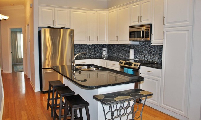 Waters Edge Condo | 3Br/3ba Townhouse with Garage and Pool access~ Folly Hill
