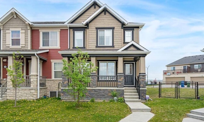 Calgary House | 3BR Townhouse with Yard, AC, Patios & Garage