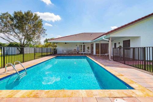 Jog Road House | 4/3.5 House with pool- Boynton Beach, FL.