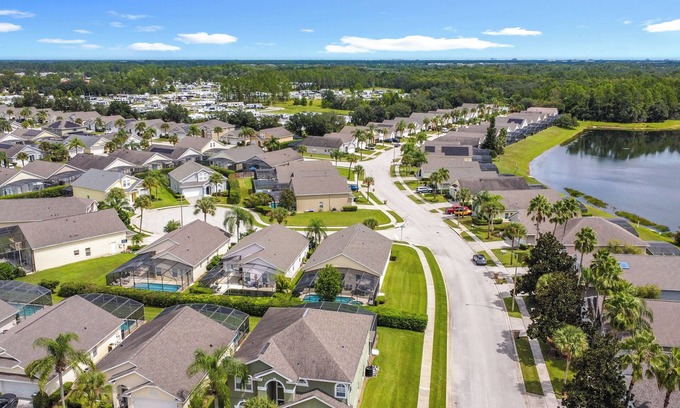 Four Corners Villa | 4-bedroom villa in welcoming Clermont with fitness room, AC