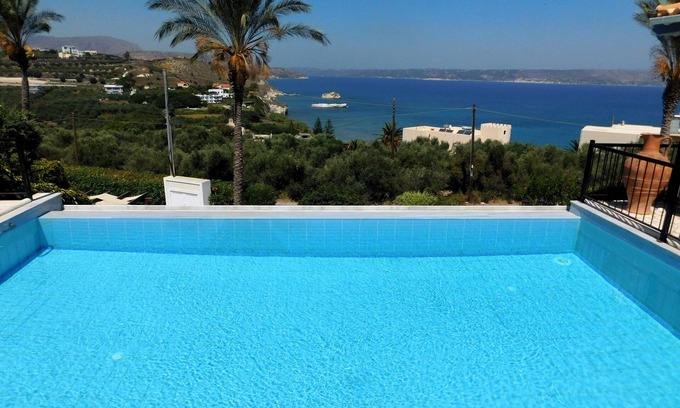 Georgioupolis Villa | 4 Bedrooms, perfect sea views, Infinity pool, Hot tub, Walk to beach & tavernas.