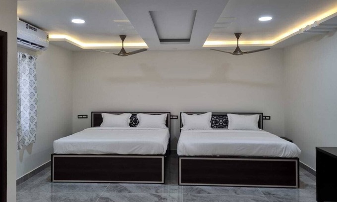 Pondicherry Beach Bed & Breakfast | 4 rooms are there. And also family rooms are there. Cinema theatre is there, bir