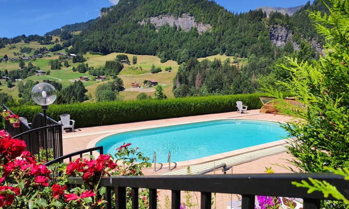Flumet Apartment | 48m2 rental in chalet with pool view