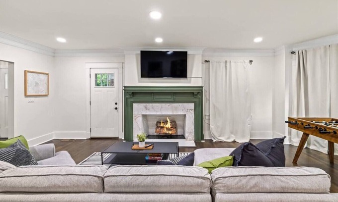 Hanover Place House | 5BR Luxury Home in Westport KC w/Jacuzzi, Foosball, Grill