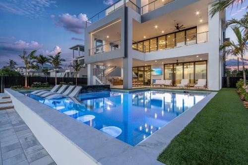 Fort Myers Beach House | 793 Shoreline Estate- 6BD 6BR, Luxurious Pool Home on The Water! home