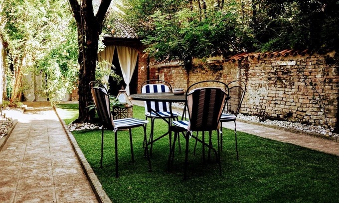 Cremona House | A garden in the shadow of the Torrazzo