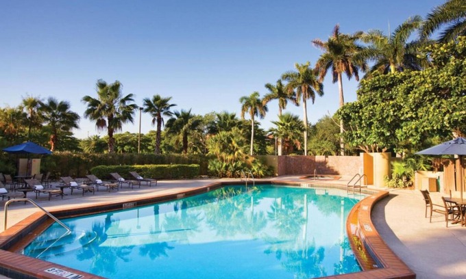 Ludlam Hotel | A short drive away from Phillips Park! 2 Contemporary Units! Pool, Pets Allowed!