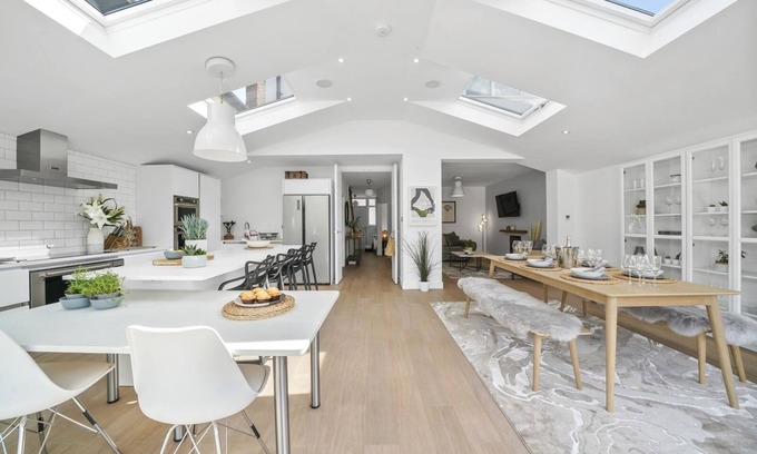 Windsor House | A stunning five-bedroom home located in the heart of Windsor driveway parking!