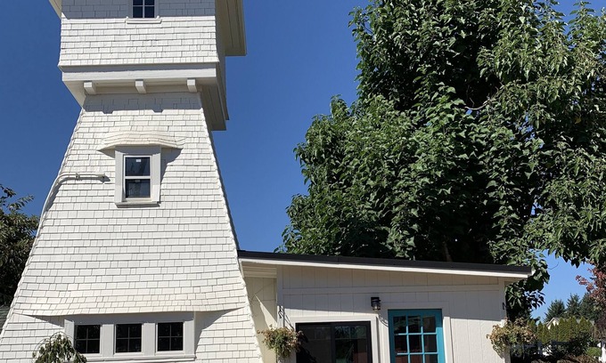 Oregon City House | A welcoming 1905 watertower on a beautiful flower farm with a hot tub