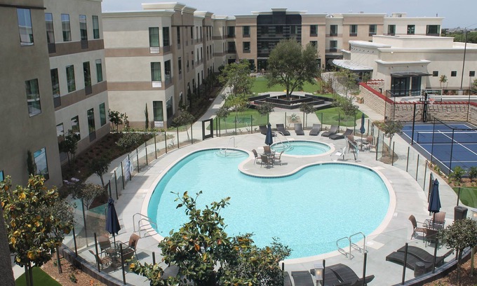 Bressi Ranch Condo | Accessible King Suite Near the Airport | Free Breakfast, Gym + Pool Access
