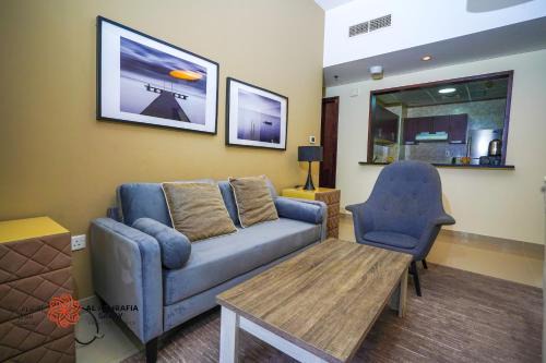 Dubai Sports City Apartment | Alashrafia Saray- Homey 1BR apartment in Sport City