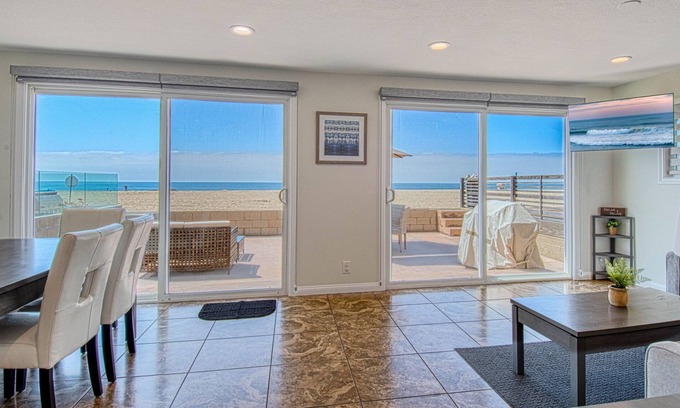 West Newport Condo | Amazing location with an amazing, newly-remodeled lower unit right on the sand!