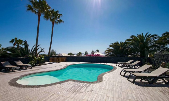Playa Blanca Villa | Amazing sea and mountain views, heated pool and jacuzzi, airconditionn